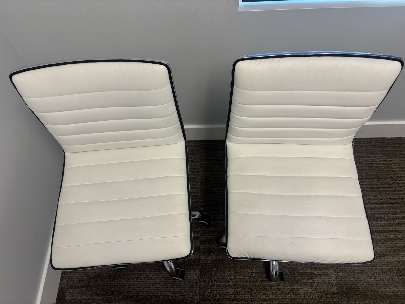 Pair of White Faux Leather Office Chairs with Chrome Base and Adjustable Height
