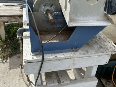 Lapidary cabbing machine.