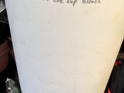 2 50 gallon food grade water storage barrels . $60 for both