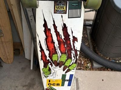 The Never Summer Longboard Skateboard with Green Wheels - Used Condition