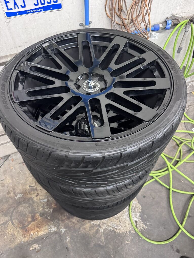 Set Of 4 Wheels & Tires - Great Tread