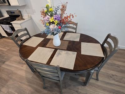 Oval Dining Table with Leaf and 4 Chairs - Wood Finish, Seats 4-6