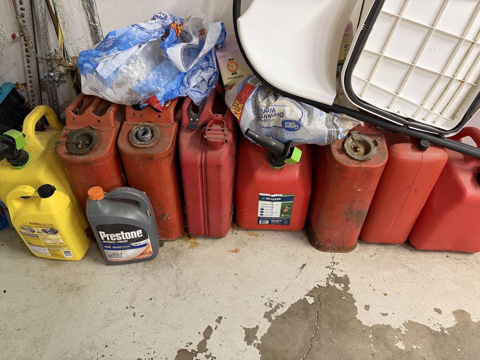 (8) Assorted 5 gal Fuel Cans and Fluid Jugs some vintage