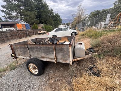 Single-Axle Utility Trailer with Wooden Side Walls and Tool Box