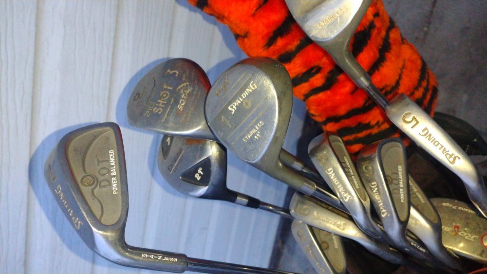 Spalding and other golf clubs and top flight bag a
