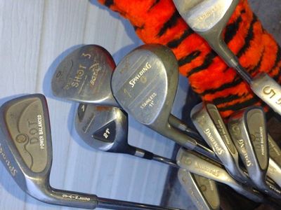 Spalding and other golf clubs and top flight bag a