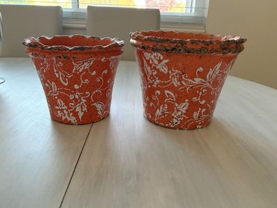 Orange and white clay pots