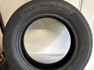 Douglas All-Season Tire 185/65R15. New/Never used.
