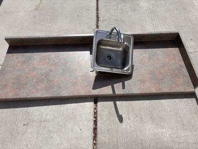 Formica Countertop W/Sink 69x24. Sink is 15x15.