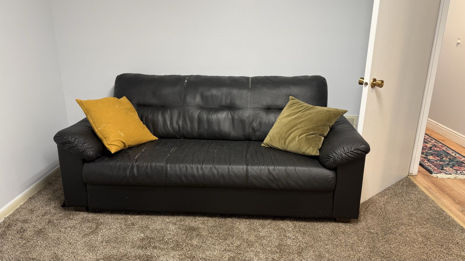 IKEA Black Faux Leather Couch with Accent Pillows