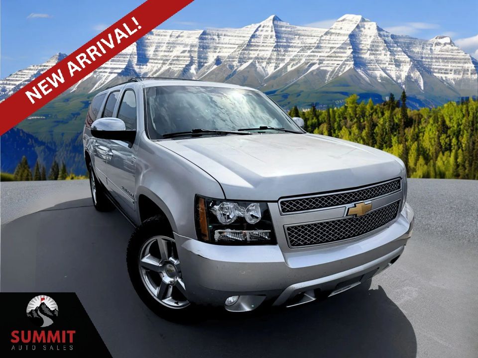 2013 Chevrolet Suburban LTZ — rebuilt & branded title, 13% below market
