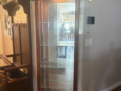 Elegant Wooden Display Cabinet with Glass Shelves and Mirrored Back - Excellent Condition