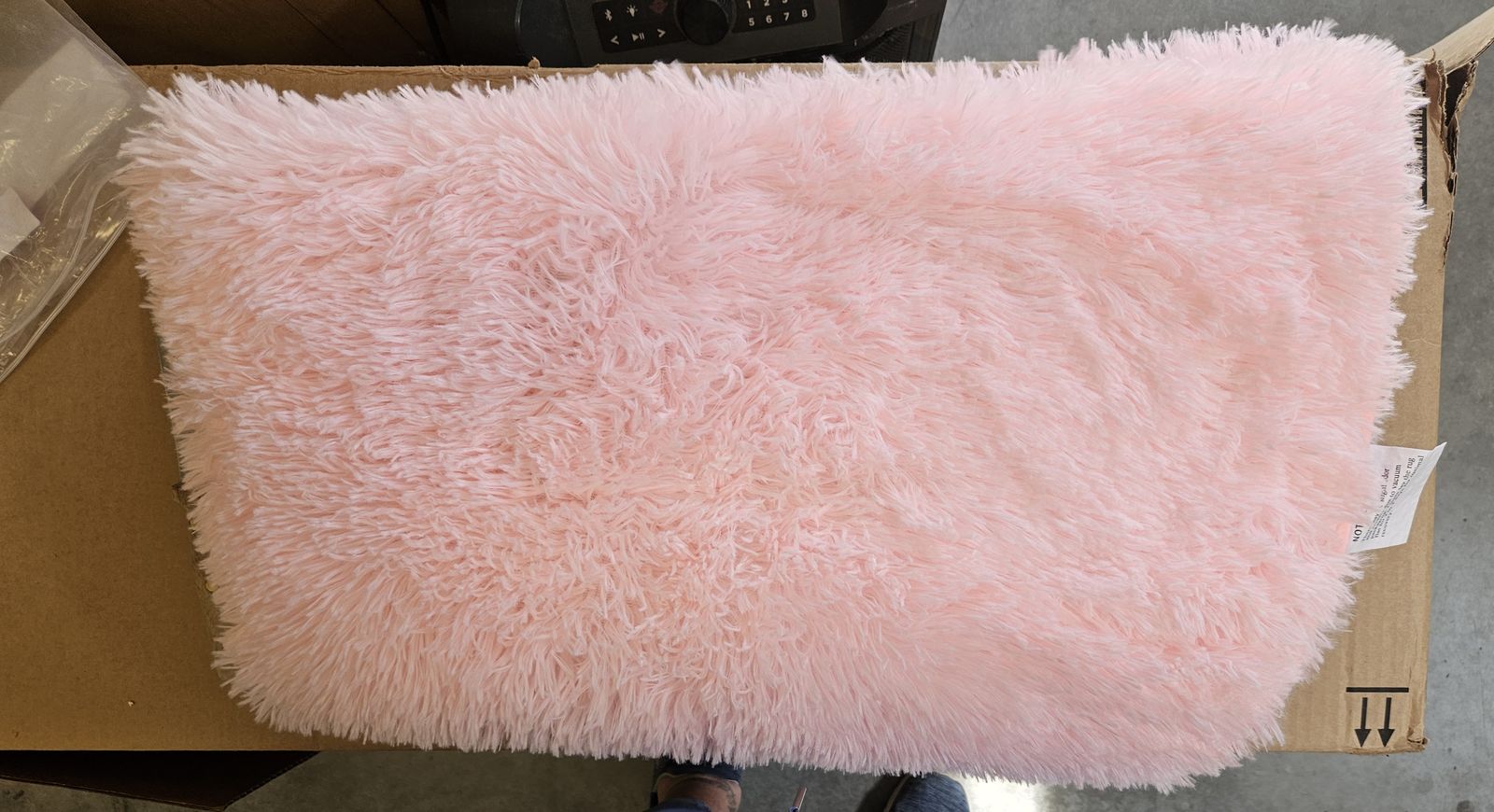 Pink fluffy rug