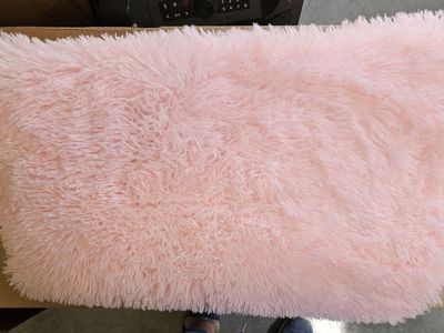 Pink fluffy rug