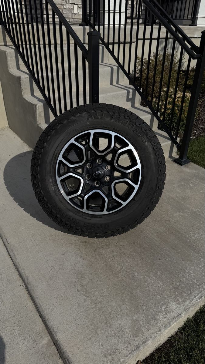 Ford F150 Rims and Tires 275/65R18 Open Range All Terrain Load E