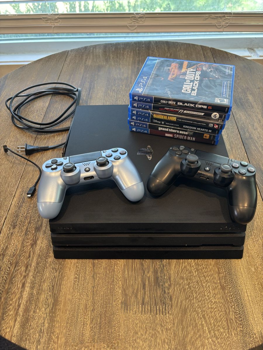 Used Sony PlayStation 4 (PS4) Pro 1TB Console Bundle - 2 Controllers & 6 Games