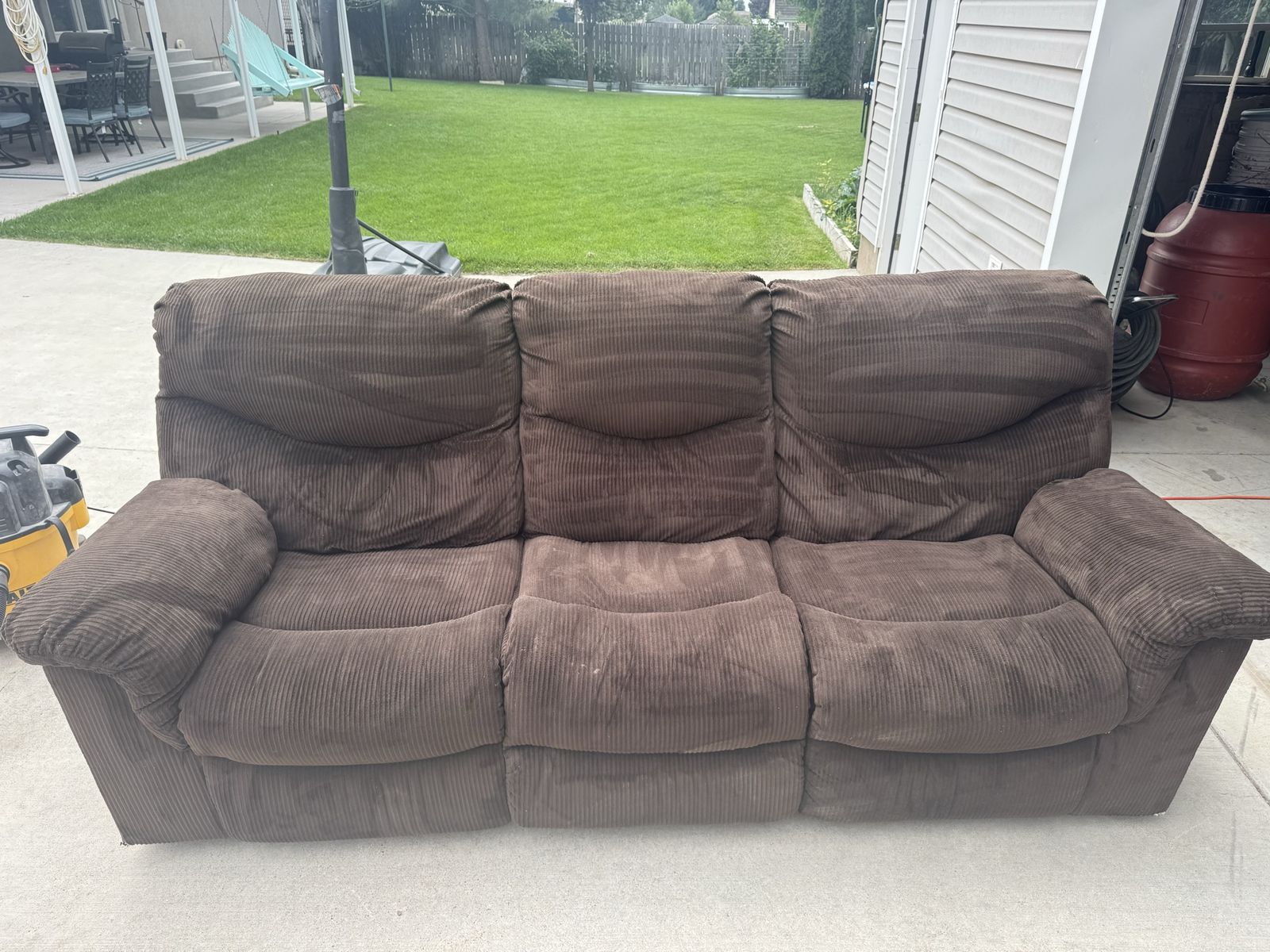 Brown reclining sofa