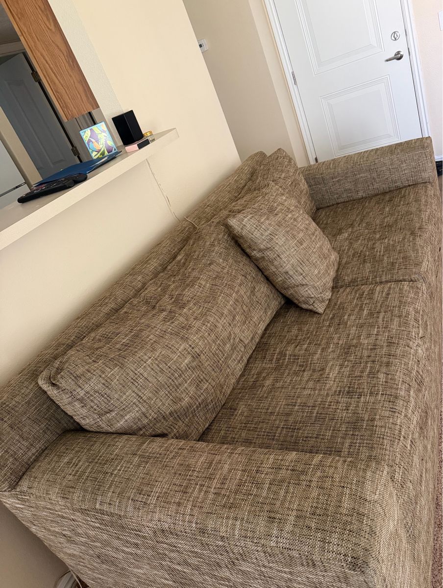 Brown Fabric Couch with Accent Pillow