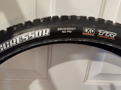Only 30 miles Maxxis Aggressor 29x2.50