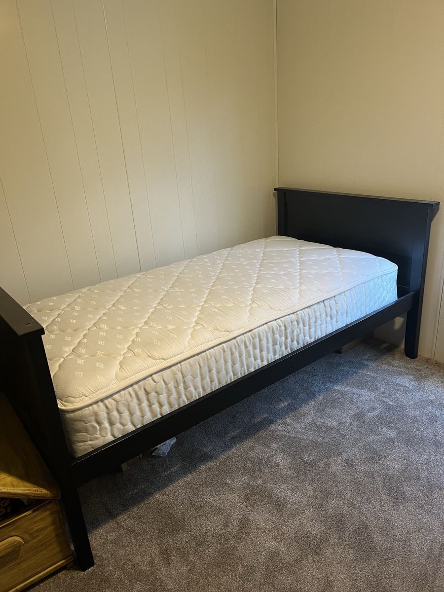 Two twin beds with mattresses