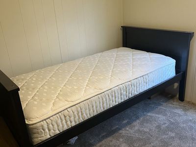 Two twin beds with mattresses