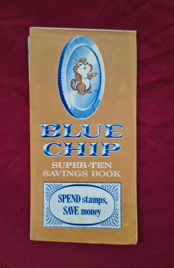 Vintage Blue Chip Trading Stamps Savings Book full of stamps.