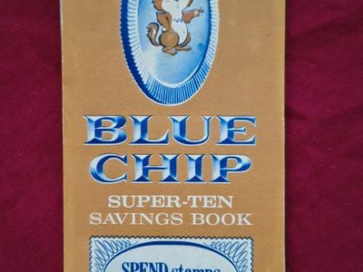 Vintage Blue Chip Trading Stamps Savings Book full of stamps.