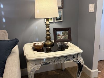 Glass topped side table