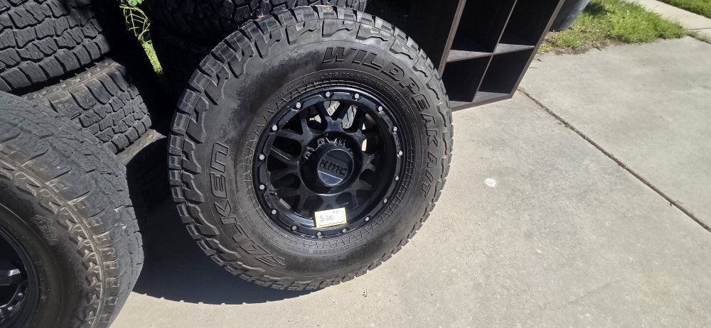 KMC KM542 8x6.5 Impact 17x9 Wheels with Falken Wildpeak A/T Tires - 4 Used