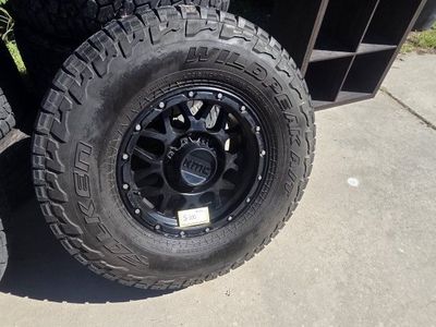 KMC KM542 8x6.5 Impact 17x9 Wheels with Falken Wildpeak A/T Tires - 4 Used