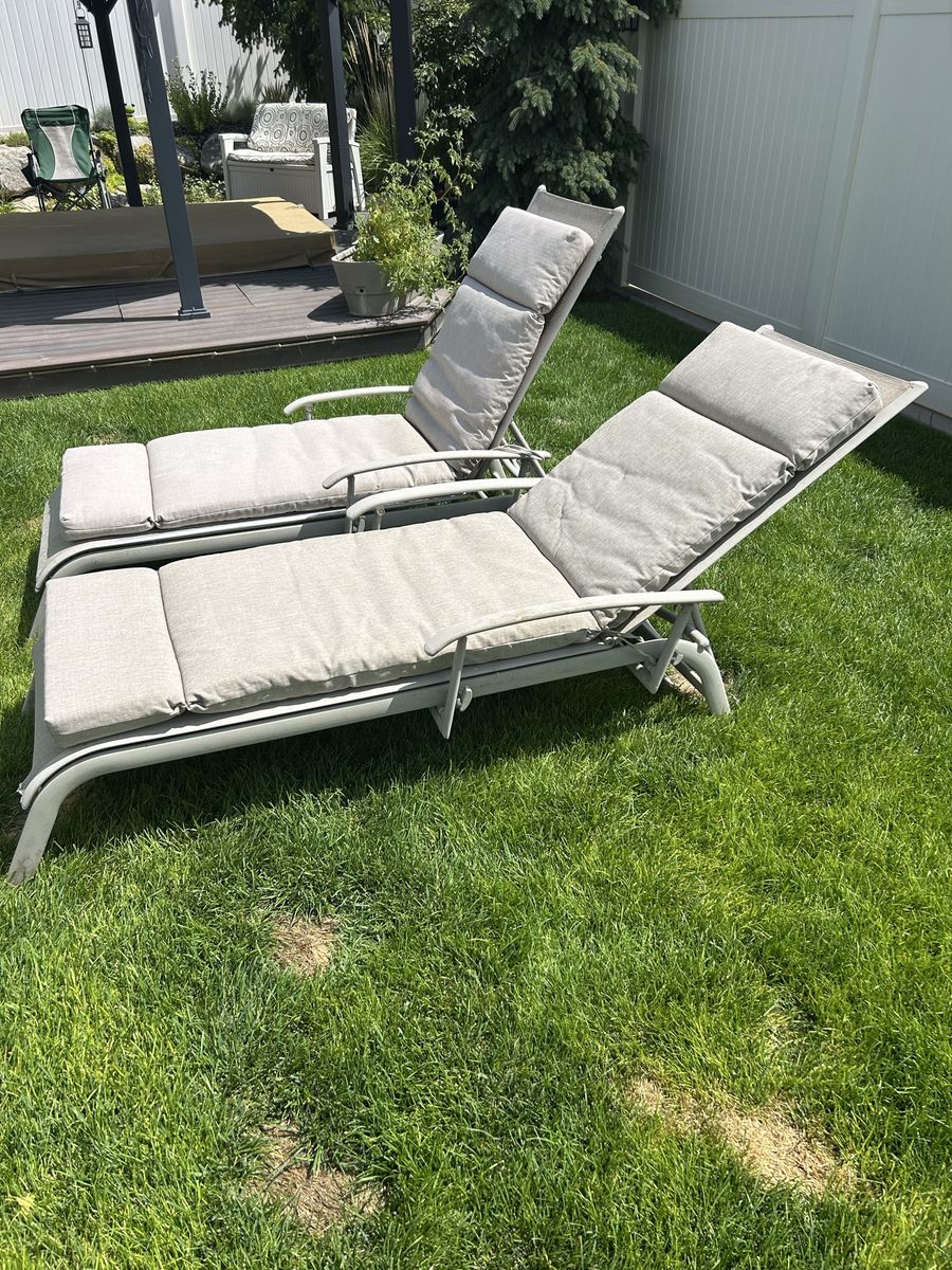 Pair of Outdoor Patio Chaise Lounge Chairs with Beige Cushions