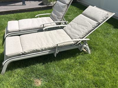 Pair of Outdoor Patio Chaise Lounge Chairs with Beige Cushions
