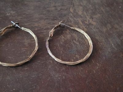 Gold Tone Twisted Hoop Earrings