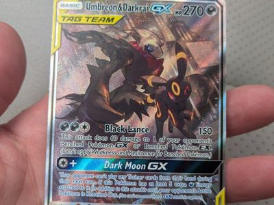 Umbreon/Darkrai GX heavily damaged