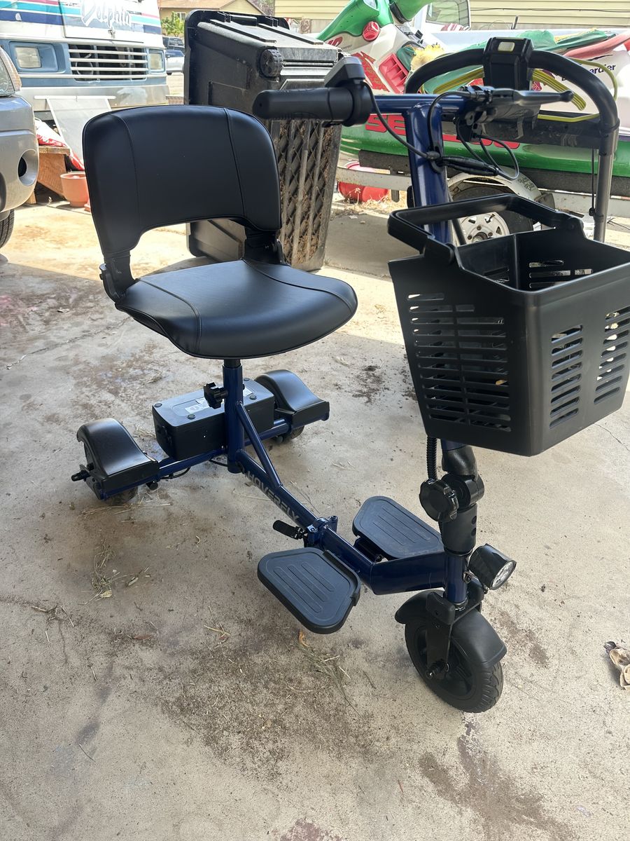 Mobility scooter with truck hitch ramp