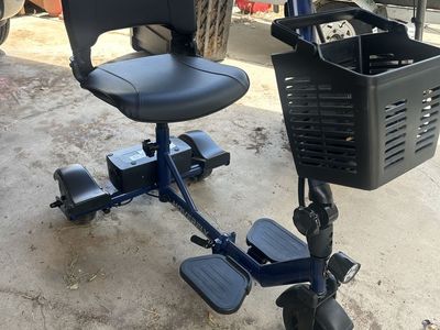 Mobility scooter with truck hitch ramp
