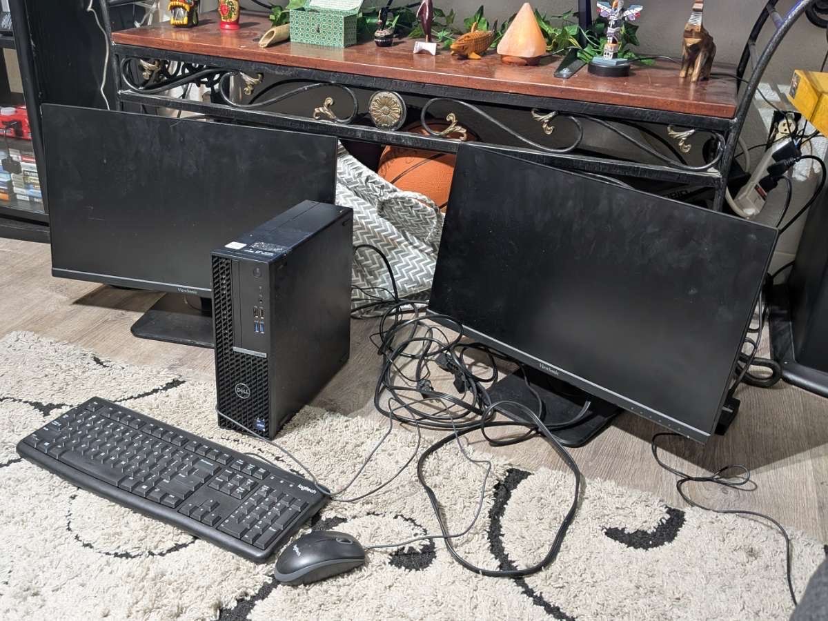 Dell OptiPlex Desktop Computer Setup with Dual ViewSonic Monitors, Keyboard, and Mouse
