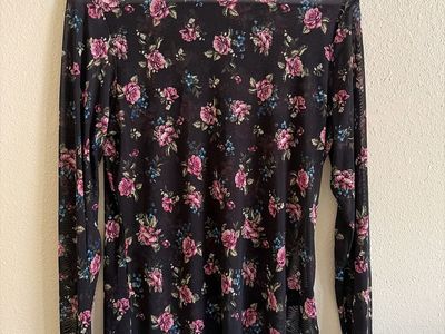 XL AFRM woman’s see through top