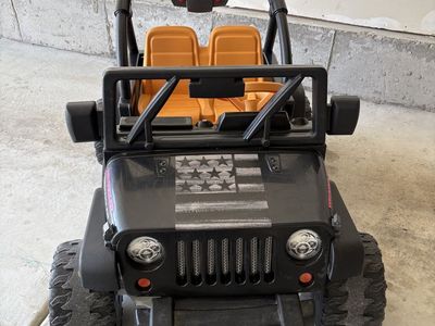 Power Wheels Jeep Wrangler Ride-On Car - Black with Orange Seats