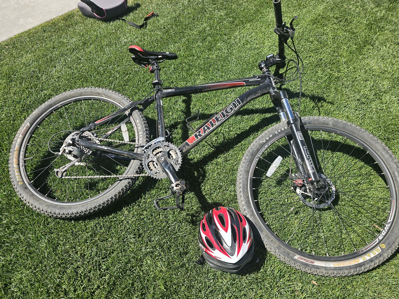Raleigh Men's mountain bike and helmet