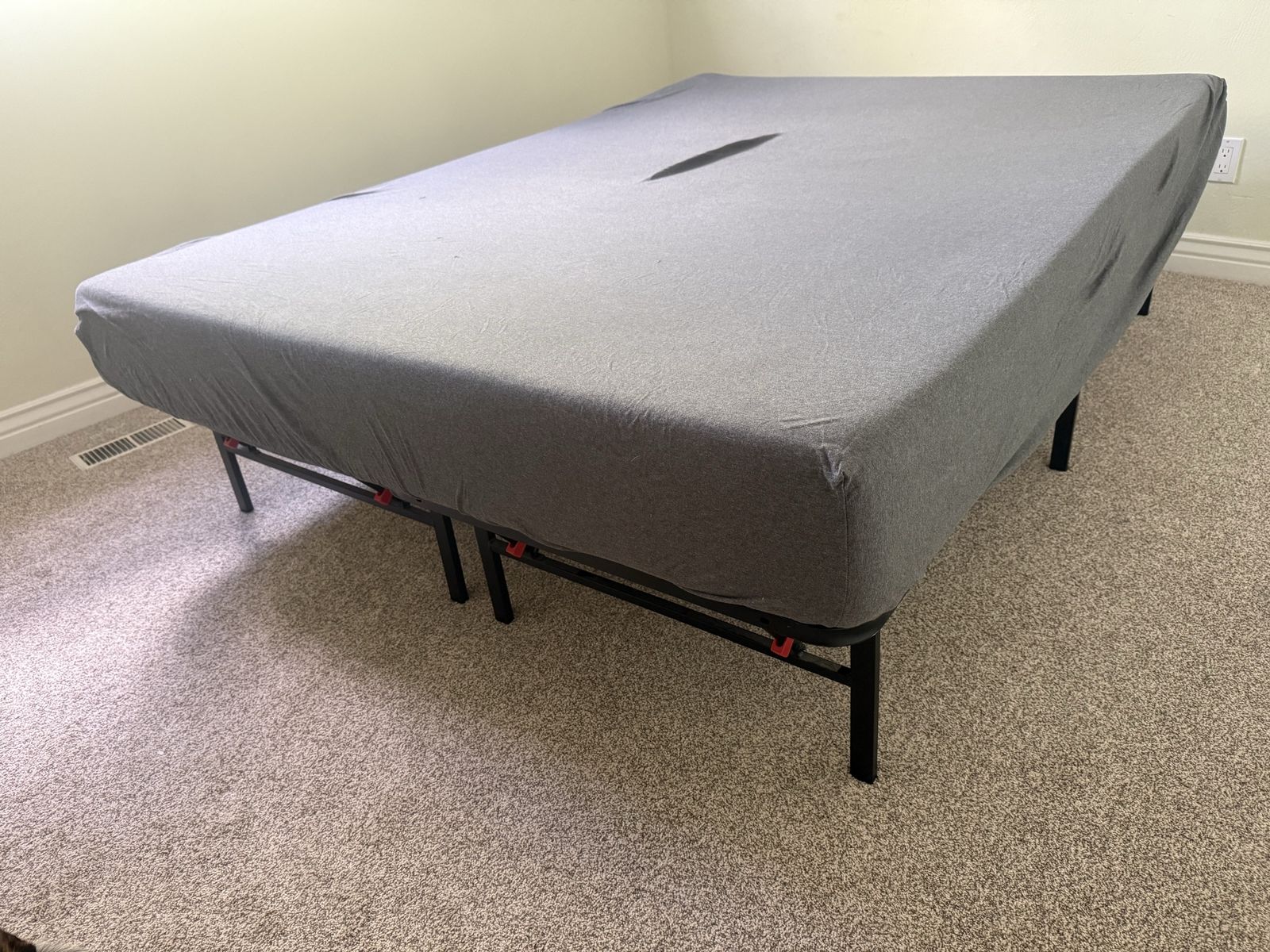 Queen size bed and frame.