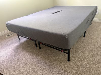 Queen size bed and frame.