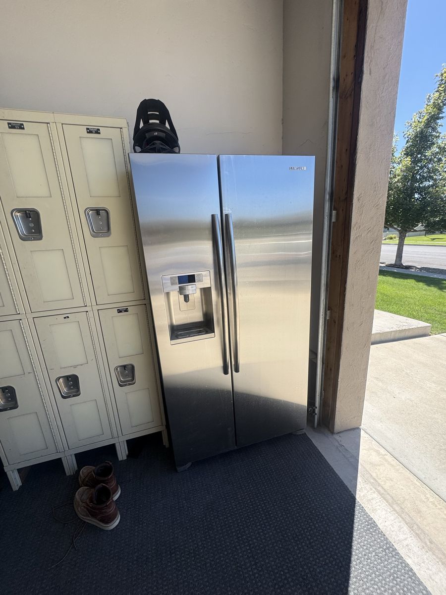 Samsung Stainless Steel Side-by-Side Refrigerator with Water Dispenser