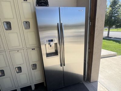 Samsung Stainless Steel Side-by-Side Refrigerator with Water Dispenser
