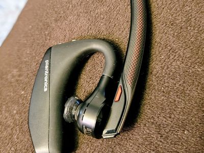 Plantronics Poly Voyager Bluetooth headset w/noise cancelling mics & charging case