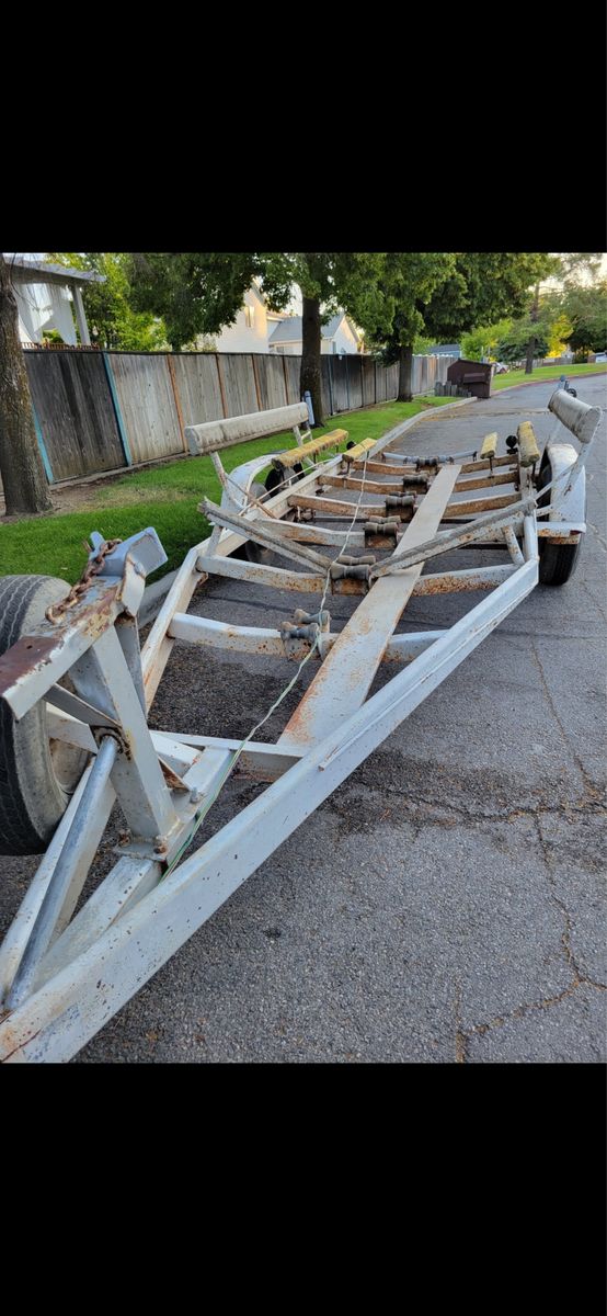 Used Boat Trailer with Rollers and Bunks, could easily be converted to flat bed trailer. 