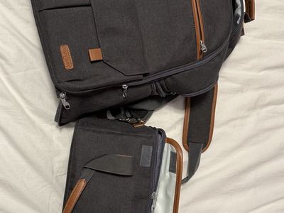 Backpack with removable camera bag