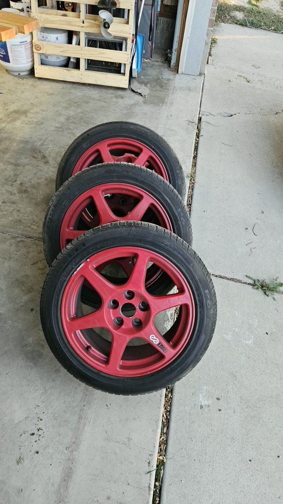 Red Enkei Evo 8 wheels