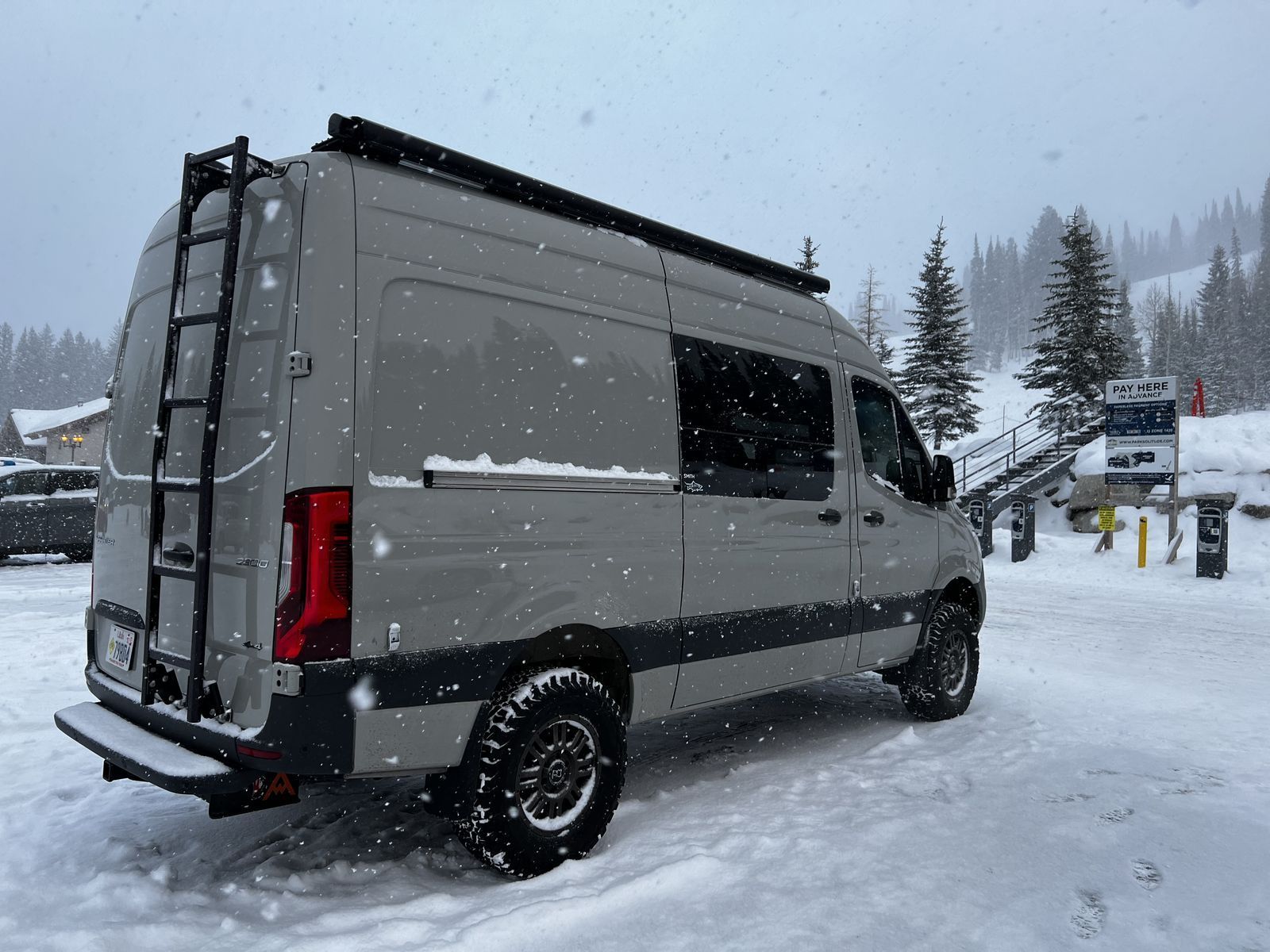 Black Adjustable Rear Door Ladder off Sprinter High Roof
