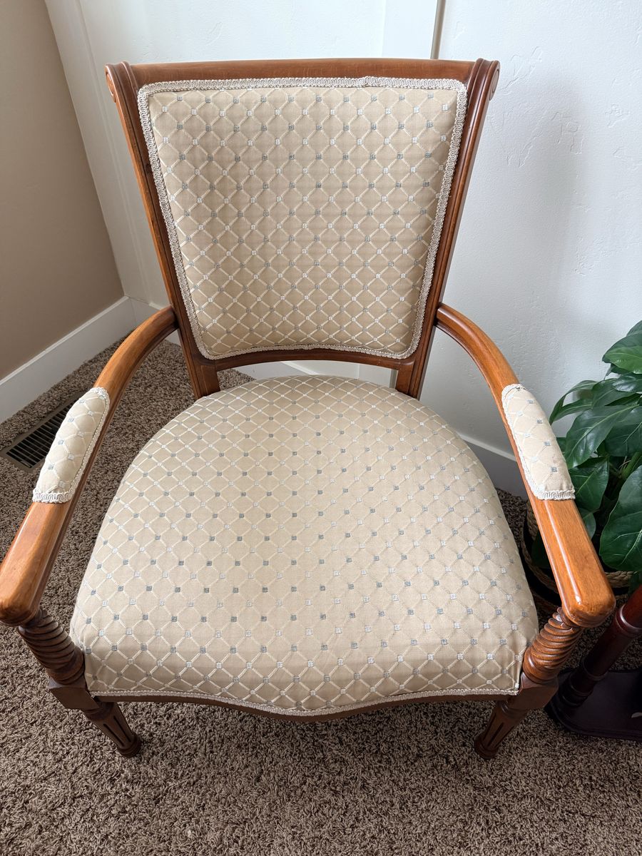 Vintage upholstered wooden armchairs